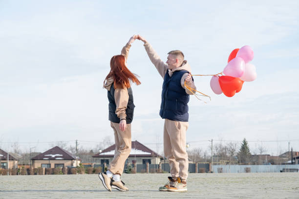 istock young couple dancing in the street 2027526585