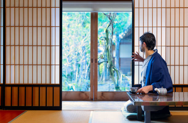istock A young caucasian man is relaxing at a traditional Japanese drinking a tea 2027608057