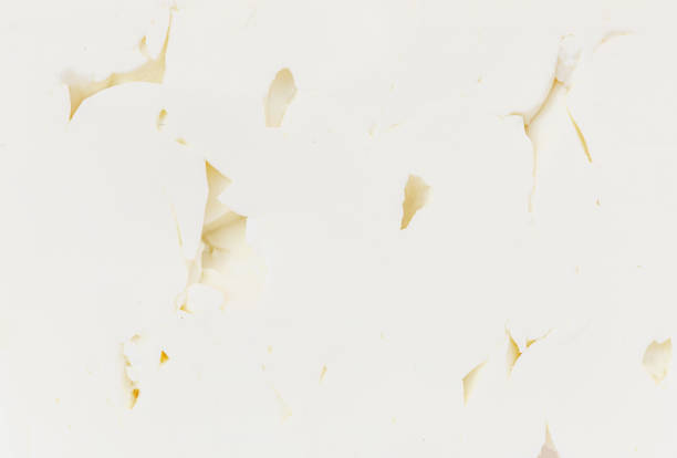 istock Feta cheese textured background. Fresh Greek feta cheese block close up. Pattern 2027614599