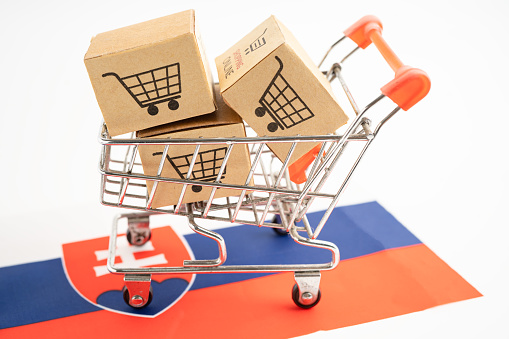 Box with shopping online cart logo and Slovakia flag, Import Export commerce finance delivery trade.