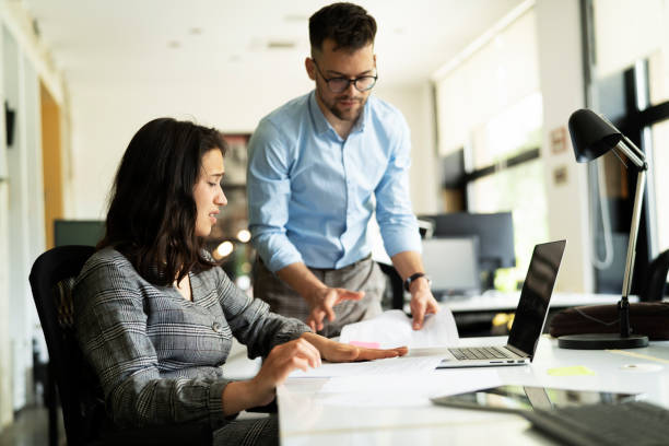 istock Businessman and his colleague. 2027628868