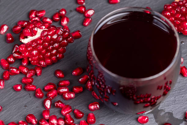 istock red grains of peeled pomegranate fruit 2027655337