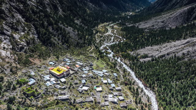 An ancient Tibetan Buddhist temple is located in a valley