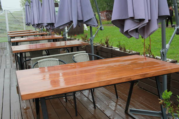 istock after the rain, outdoor cafe tables. A closed 2027678762