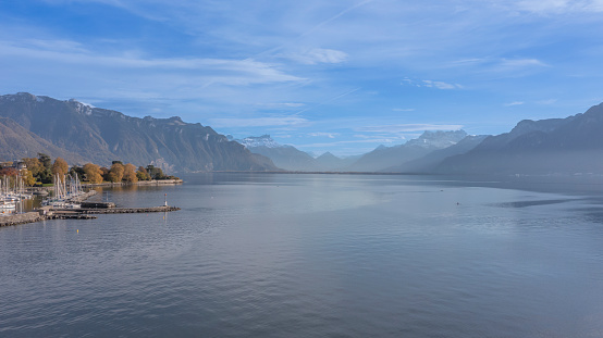 Drone Aerial view of View over Lake Geneva, Swiss and French Alps, Vevey and city scenery scape switzerland