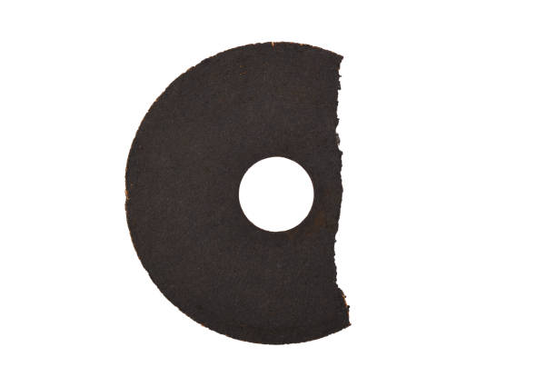 istock Broken abrasive wheel for an angle grinder on a white background.Accidents involving angle grinders. Cutting disc is broken. 2027694228