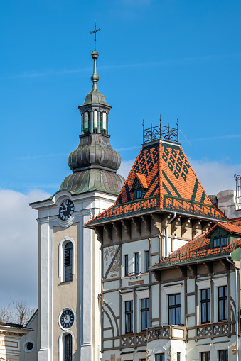 The tower of the Art Nouveau tenement house under the frogs and the tower of the Martin Luther church in Bielsko-Biaa