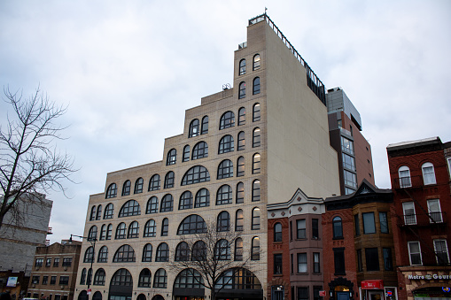 nyc, United States – February 01, 2024: A modern tall building featuring numerous windows. New York