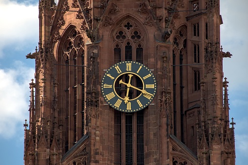 The clock tower of Frankfurt Cathedral. Germany