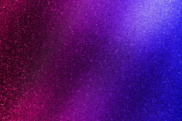 istock Red purple and blue glitter background with gradient and grain effect 2027753592