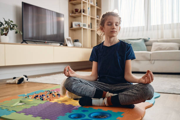 istock Beautiful boy doing yoga 2027759077