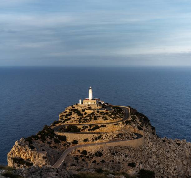 A view of the Cap de Formentor lighthouse on Mallorca in warm evening light