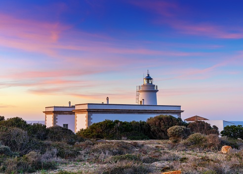 Landscape view of the Cap Blanc lighthouse in southern Mallorca at sunrise