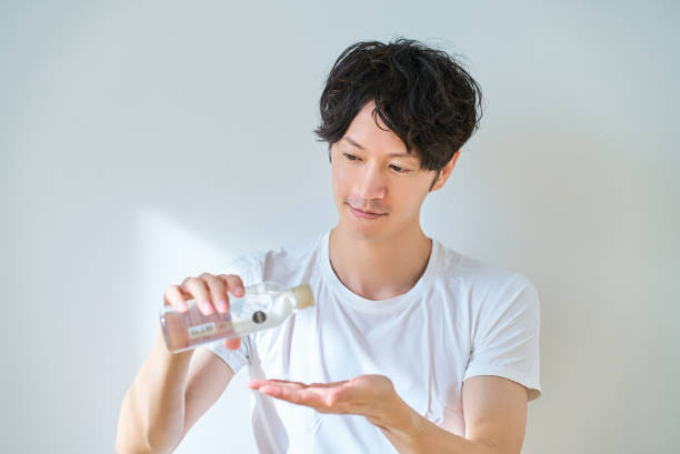 istock young man doing skin care 2027773144
