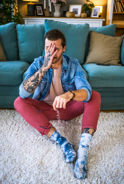 istock Young upset man at home 2027782279