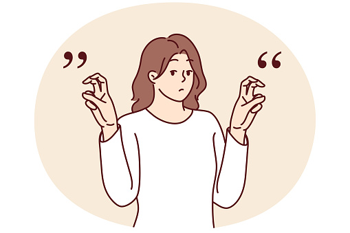 Young woman gesticulates with quotation marks with fingers while saying sarcastic words or hints. Teenager girl raises hands demonstrating quotes before telling sarcastic story or difficult joke