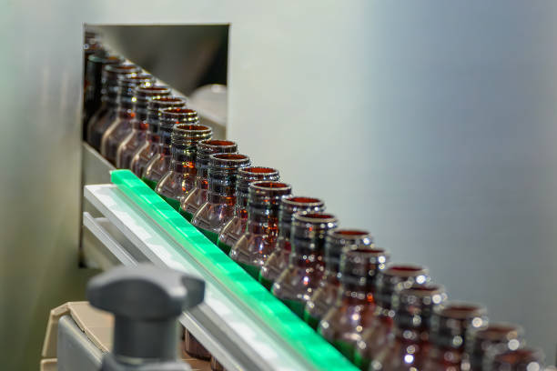 istock The  empty drug  bottles  on the conveyor belt for filling process. 2027800660