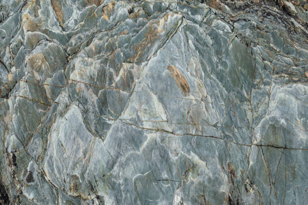 istock Rustic background, similar to water. Giant blue rock 2027804353