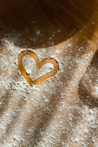 High angle view of a heart shape on the floor at the table