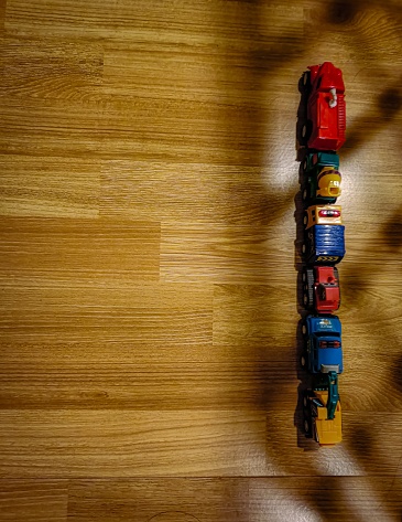 Toy lining on floor with shadow