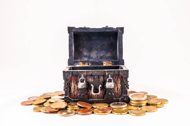 Treasure chest filled with chocolate coins of the queen Elizabeth.