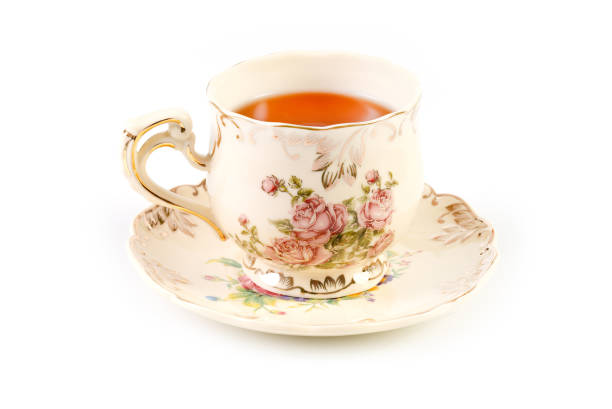istock Pretty porcelain tea cup with tea 2027853213
