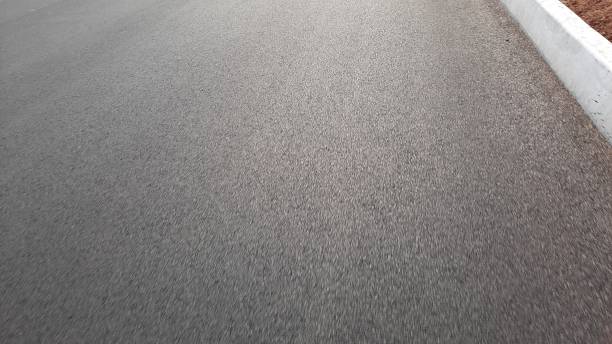 istock Asphalt road texture. Asphalt background. Black and white. 2027887194