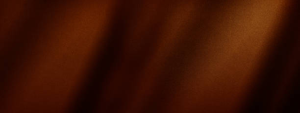 Black dark brown orange gold abstract luxury background. Silk satin fabric. Color gradient. Drapery. Chocolate shade. Shiny glow glitter light. Wide banner. Black dark brown orange gold abstract luxury background. Silk satin fabric. Gradient ombre color. Curtain drapery fold line. Chocolate shade. Shiny glow glitter light. Design. Wide banner. Panoramic. copper wall stock pictures, royalty-free photos & images