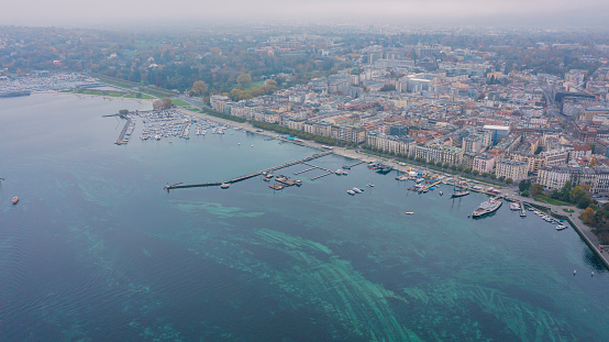 drone aerial view of Geneva City Switzerland with view over Geneva city center ,Aerial view of Geneva and the harbour along Lake Geneva