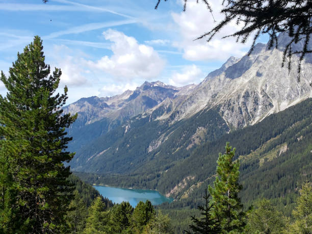 istock Alpine lake in summer 2027995666