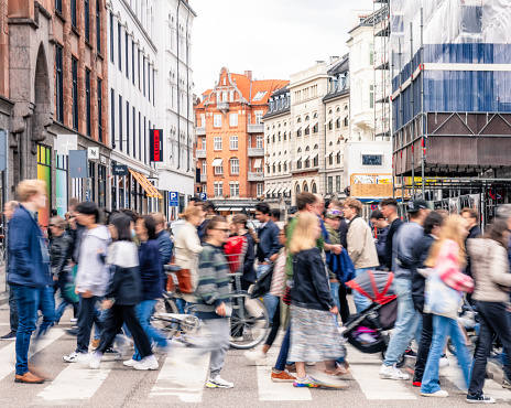 Motion blur as a crowd of people cross the street in central Copenhagen, Denmark.