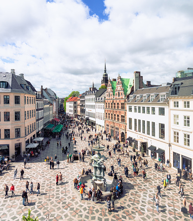 A view looking along Strøget, Copenhagen's busiest shopping district, busy with visitors and shoppers at the weekend.