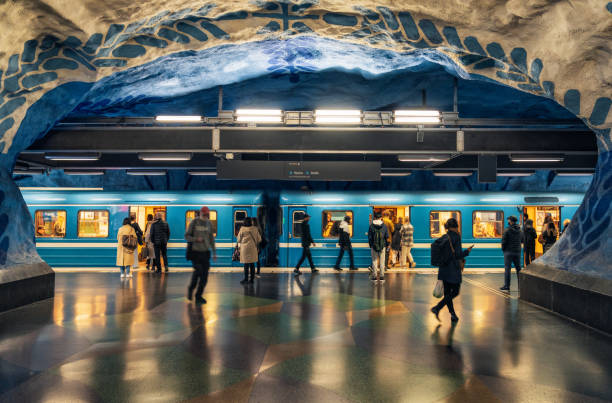 Passengers getting on and off a subway train at T-Centralen station in downtown Stockholm.