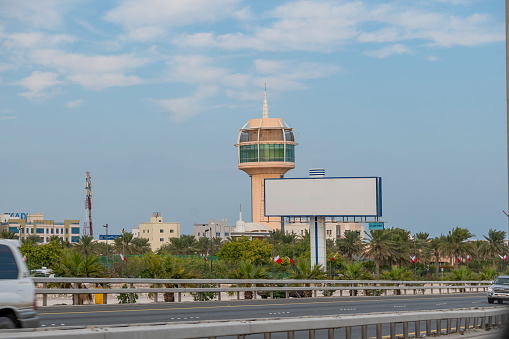 Manama, Bahrain - December 28, 2023: Beautiful building and the coffee house tower in Prince Khalifa Bin Salman Park Hidd Bahrain