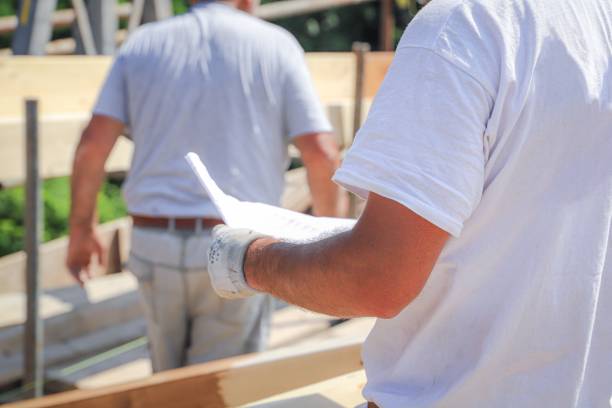 istock renovation of a roof - workers at work 2028053642