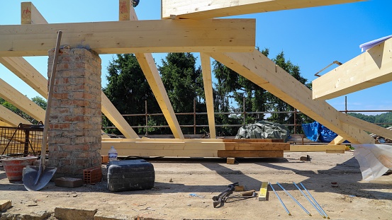 renovation of a roof - wooden beams. construction site -