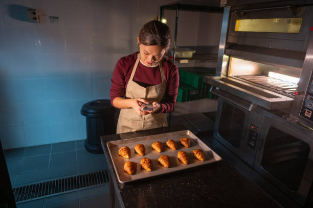 Through the Lens of Taste: Asian Woman Captures Culinary Magic in Cooking School Kitchen