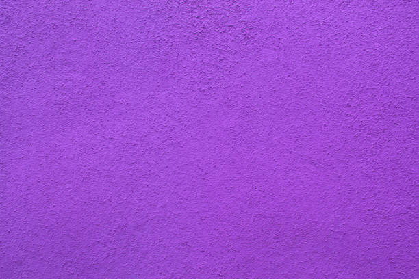 Old plaster surface, texture stucco background, close up grunge texture of purple painted cement, concrete wall texture. Wallpaper, backdrop, architecture design element