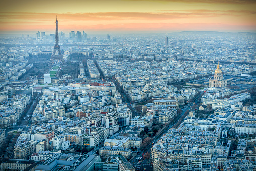 Cityscape of Paris from the Montparnasse Tower, with the Eiffel Tower (left) and Les Invalides church (right), France