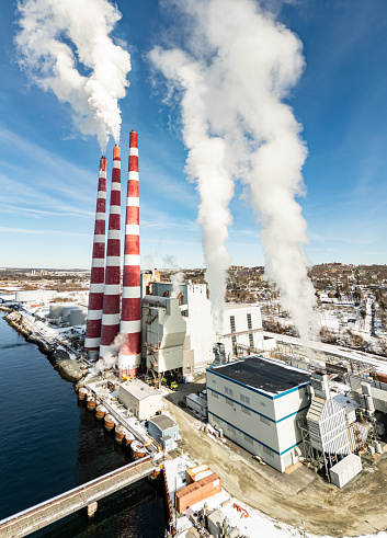 Aerial view of natural gas fired power generating station on a cold Winter day.