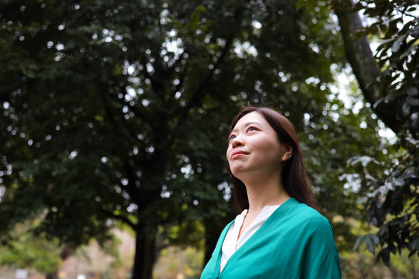 istock Young woman in the forest 2028206543
