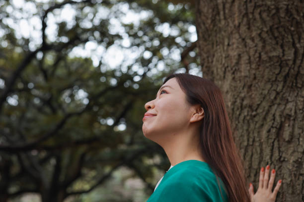 istock Young woman in the forest 2028206576