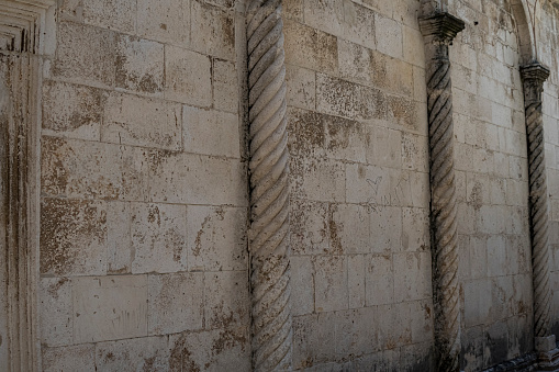Pillars at the side wall of Church of Saint Chrysogonus in the city of Zadar