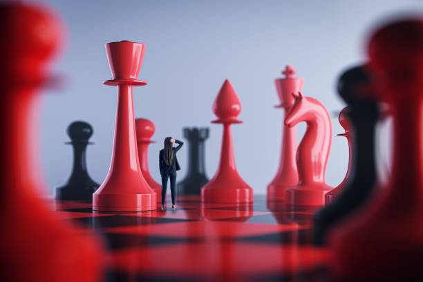 istock Professional pondering next move in a chess game concept, strategic business analysis and leadership 2028230674