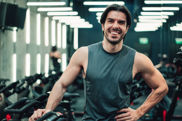 istock Confident young male athlete working out in a gym. 2028231754