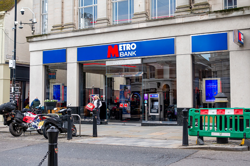 A branches of of Metro Bank in the High Street, Colchester, Essex, Eastern England, on a dull November day.