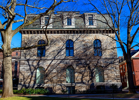 Cambridge, Massachusetts, USA - February 19, 2024: Boylston Hall (c. 1858) is an academic office building and lecture hall near the southwst corner of Harvard Yard on the Harvard University campus. An Italian Renaissance-style building with outer walls of Rockport granite.