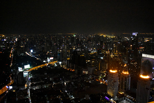 Bangkok high-rise buildings with city lights.