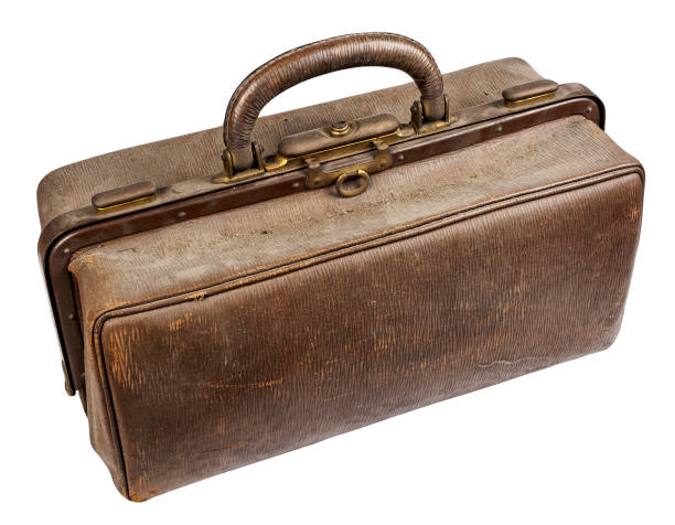 istock Old dusty doctor bag on white 2028280764