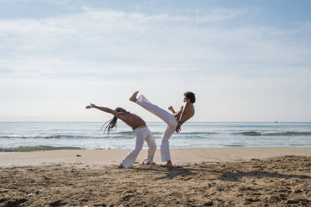 istock Mid adult men performing capoeira 2028292741